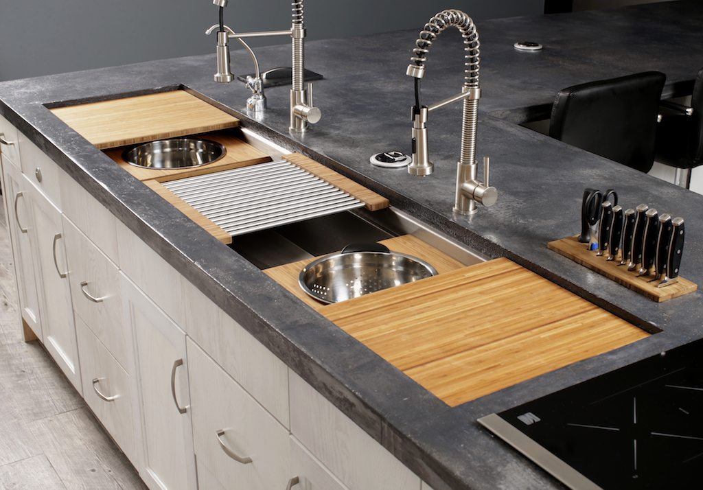 galley kitchen with sink in island